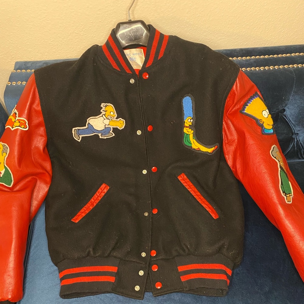 AUTHENTIC THE SIMPSON’S SHOW CREW JACKET with patches of different characters.